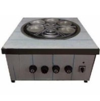 6 gözlü, motorlu dönme mekanizmasına sahip, paslanmaz çelik gövdeli setüstü gazlı künefe pişirme ocağı görseli. (Görseldeki beyazlık paslanmaz çeliği koruyan film tabakasıdır).