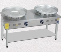 120x50x85 cm boyutlarında, 28 kg ağırlığında, iki pişirme gözlü profesyonel paslanmaz tantuni ocağı. CE belgeli, 13,70 kW ısıtma kapasiteli, ergonomik tasarımlı, LPG ve NG dönüşümlü sanayi tipi tantuni pişirme ve satış tezgahı modeli.